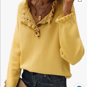 Yellow ruffle-collared sweater